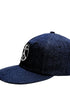 Side view of Surfing Cowboys Flex-Bill Peace Patch Shop Cap in dark denim.
