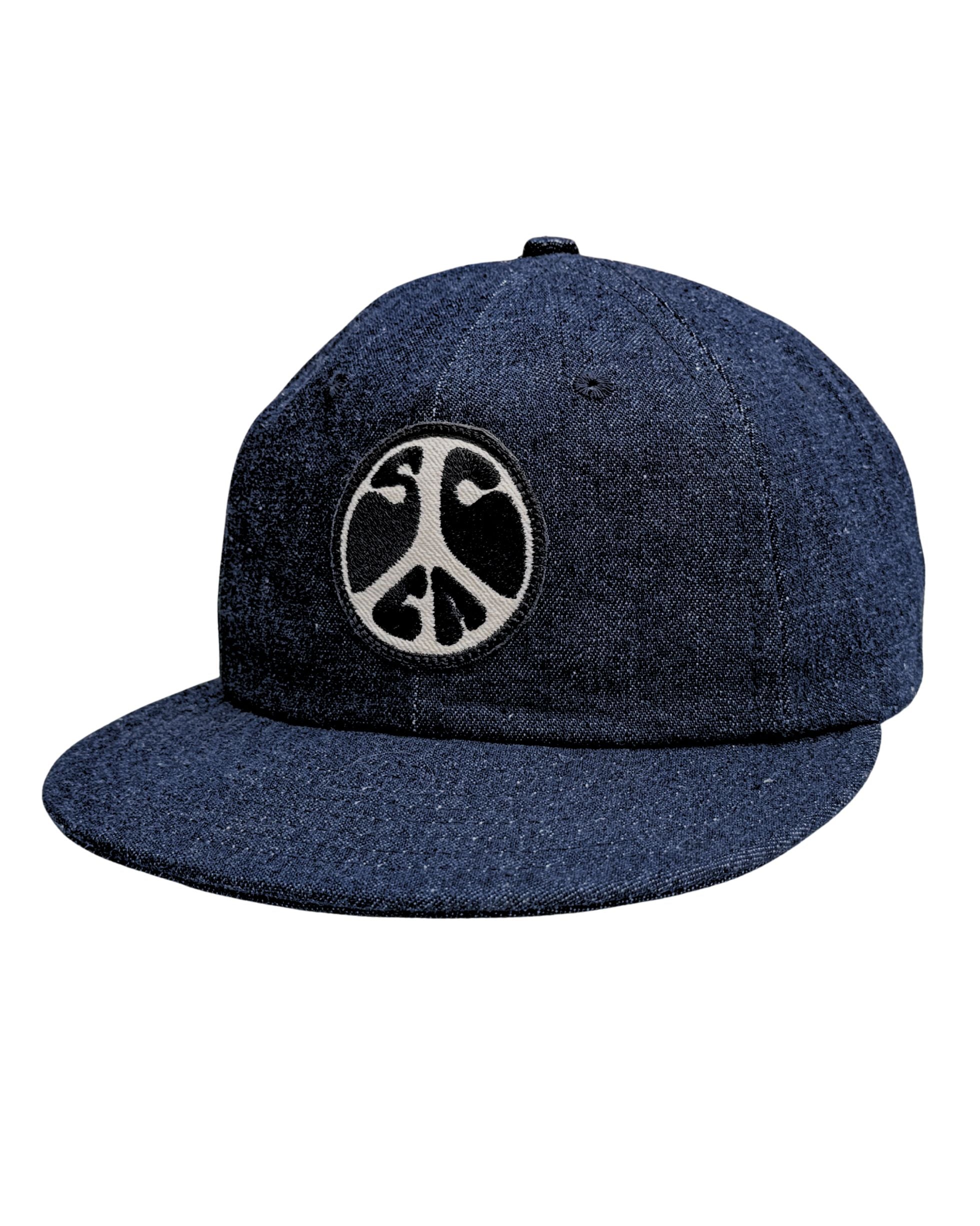 Front view of Surfing Cowboys Flex-Bill Peace Patch Shop Cap in dark denim.