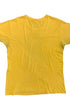 • The blank back view of a rare, premium vintage 1970s Frank Zappa yellow cotton t-shirt showcasing natural fade and authentic character.