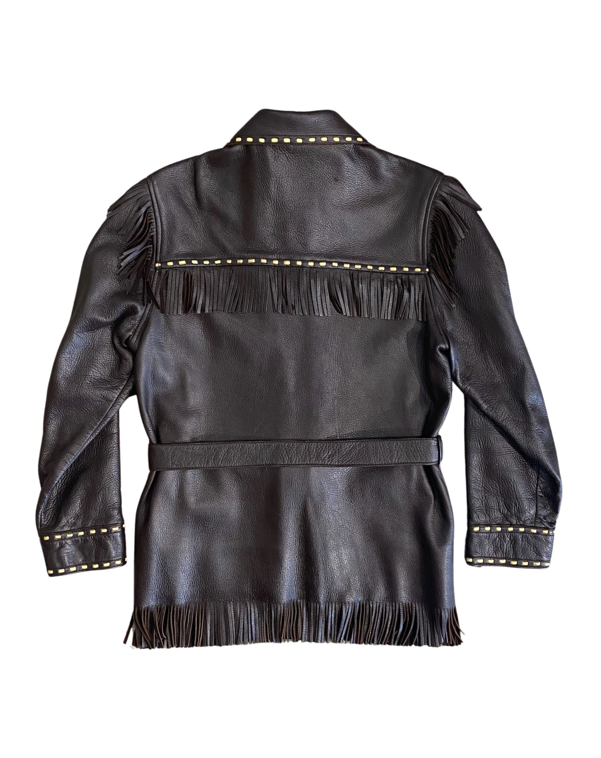 Back view of jacket showing long fringe and belted waist.