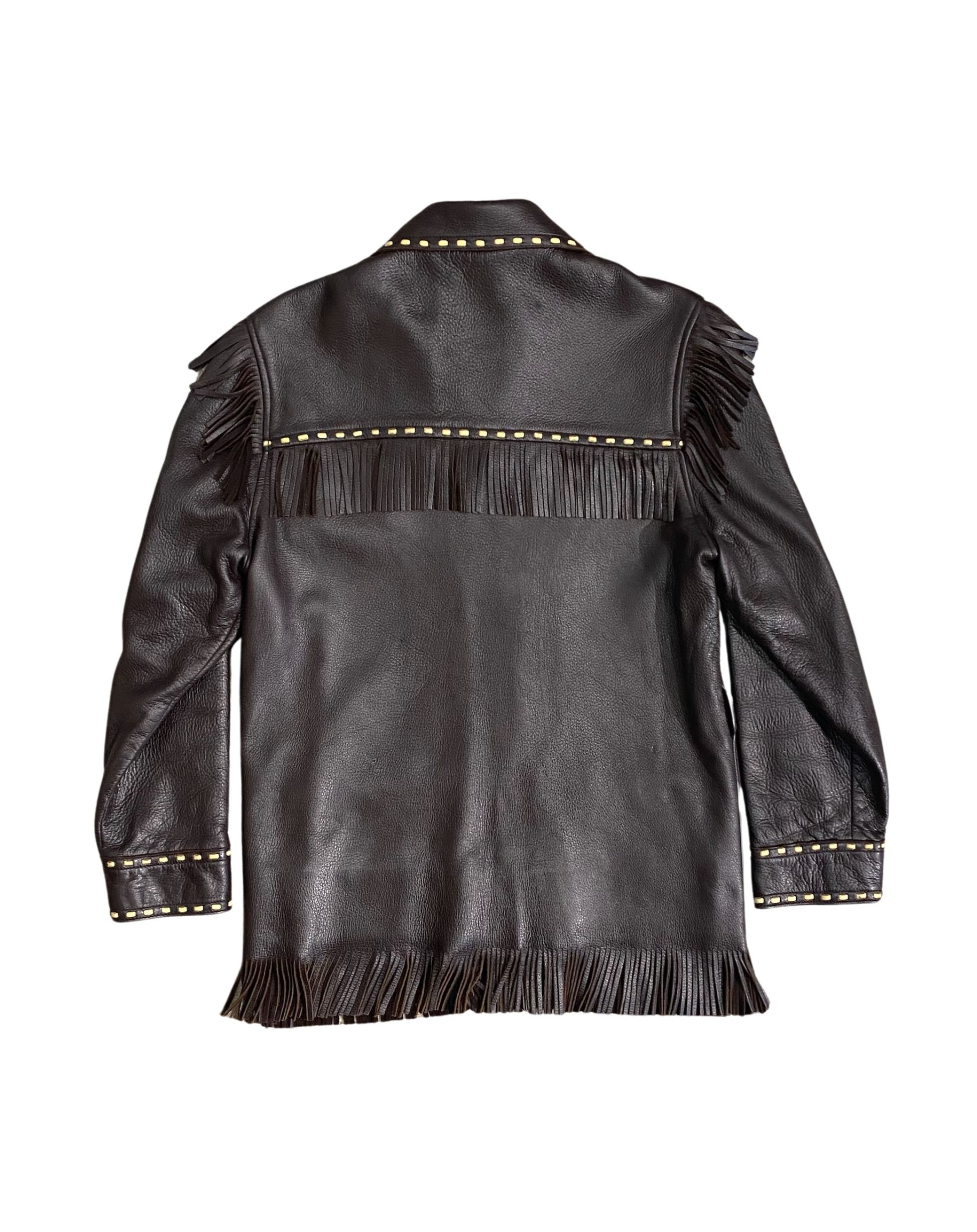Back view of jacket showing long fringe and un-belted waist.