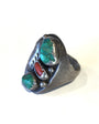 The full view of the right side of the Vintage Native American Turquoise and Coral Silver Ring.