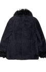 Back view of vintage Georges Rech coat showing black wool texture and dramatic fur-trimmed collar and cuffs.