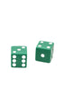 Close-up of two green dice with white pips.
