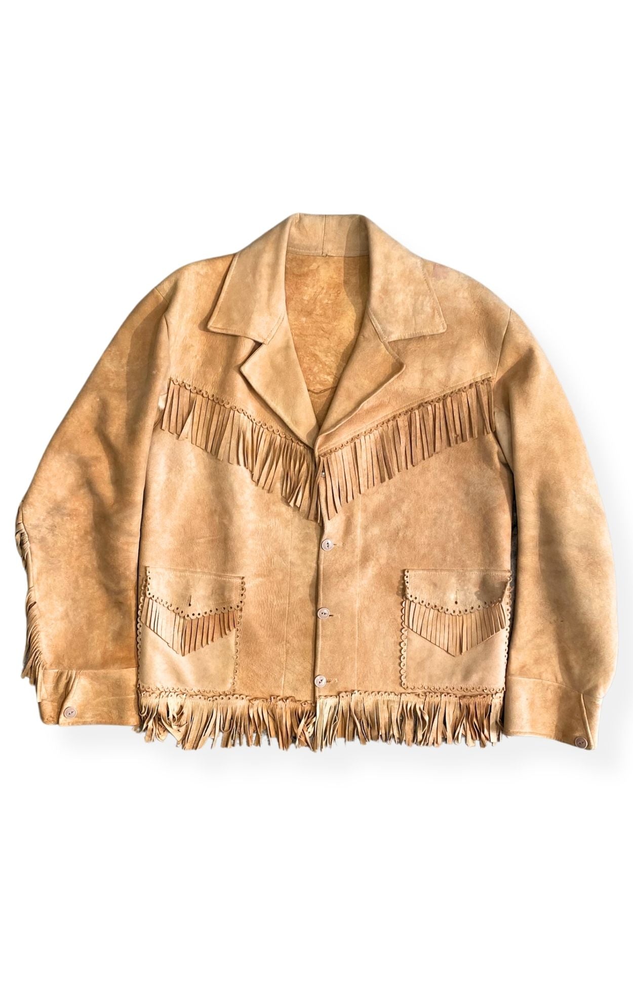 Front view of 1970s handmade tan suede fringe jacket with patch pockets.
