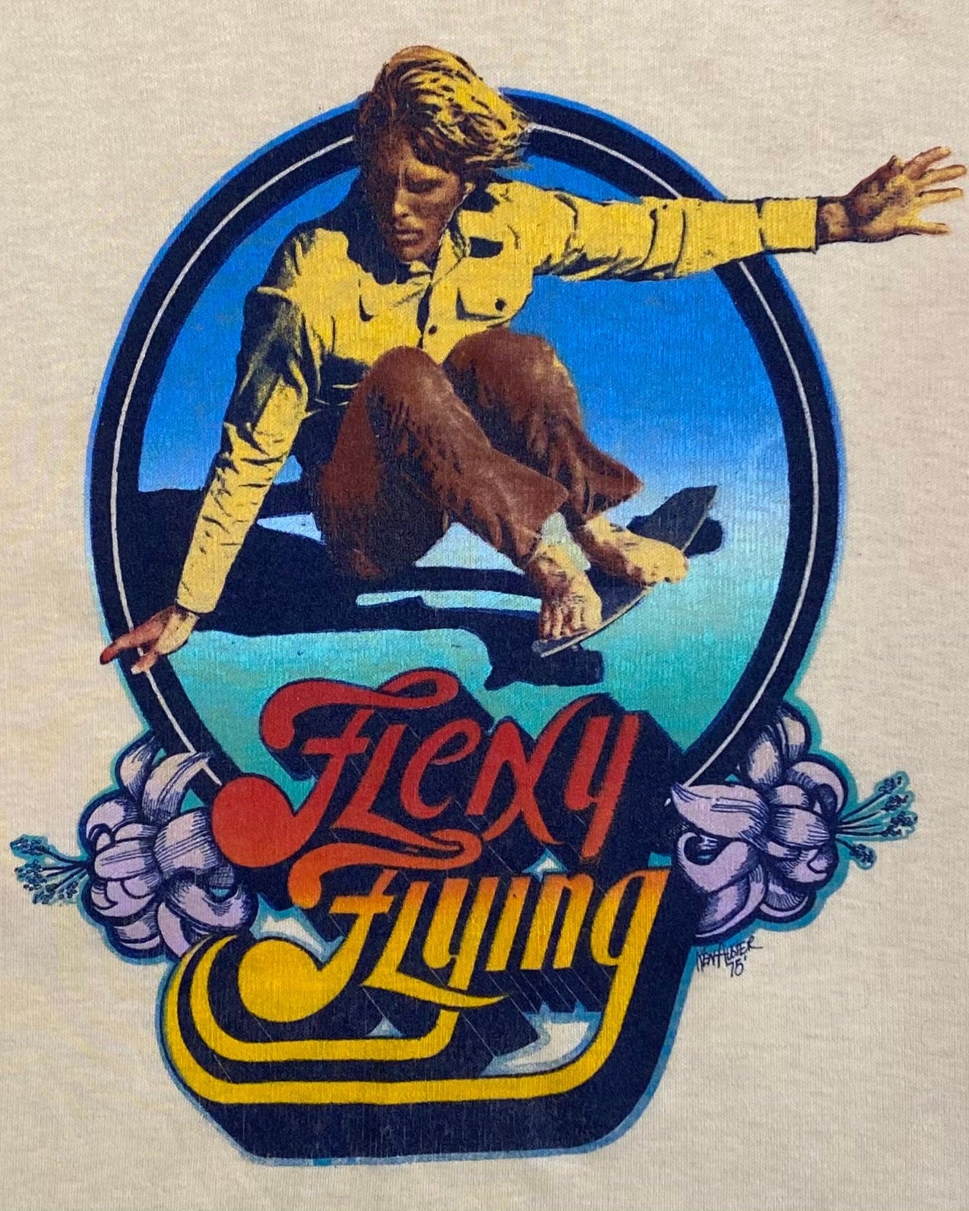 Hang Ten “Flexy Flying” Ken Auster Artwork T-Shirt 1975 – Yellow – Large