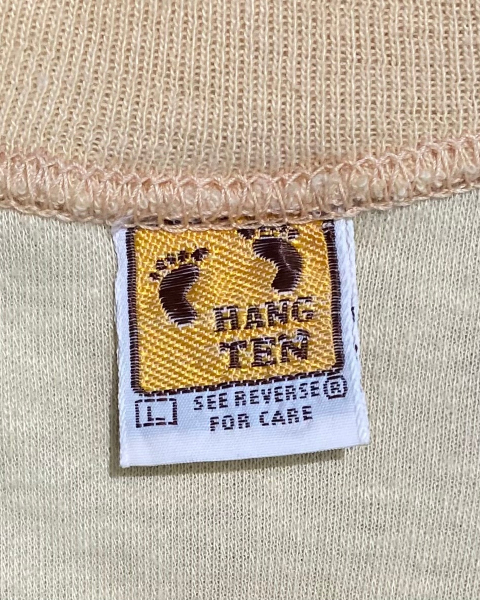Hang Ten “Flexy Flying” Ken Auster Artwork T-Shirt 1975 – Yellow – Large