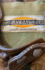Harley-Davidson brown leather café racer jacket neck tag.
