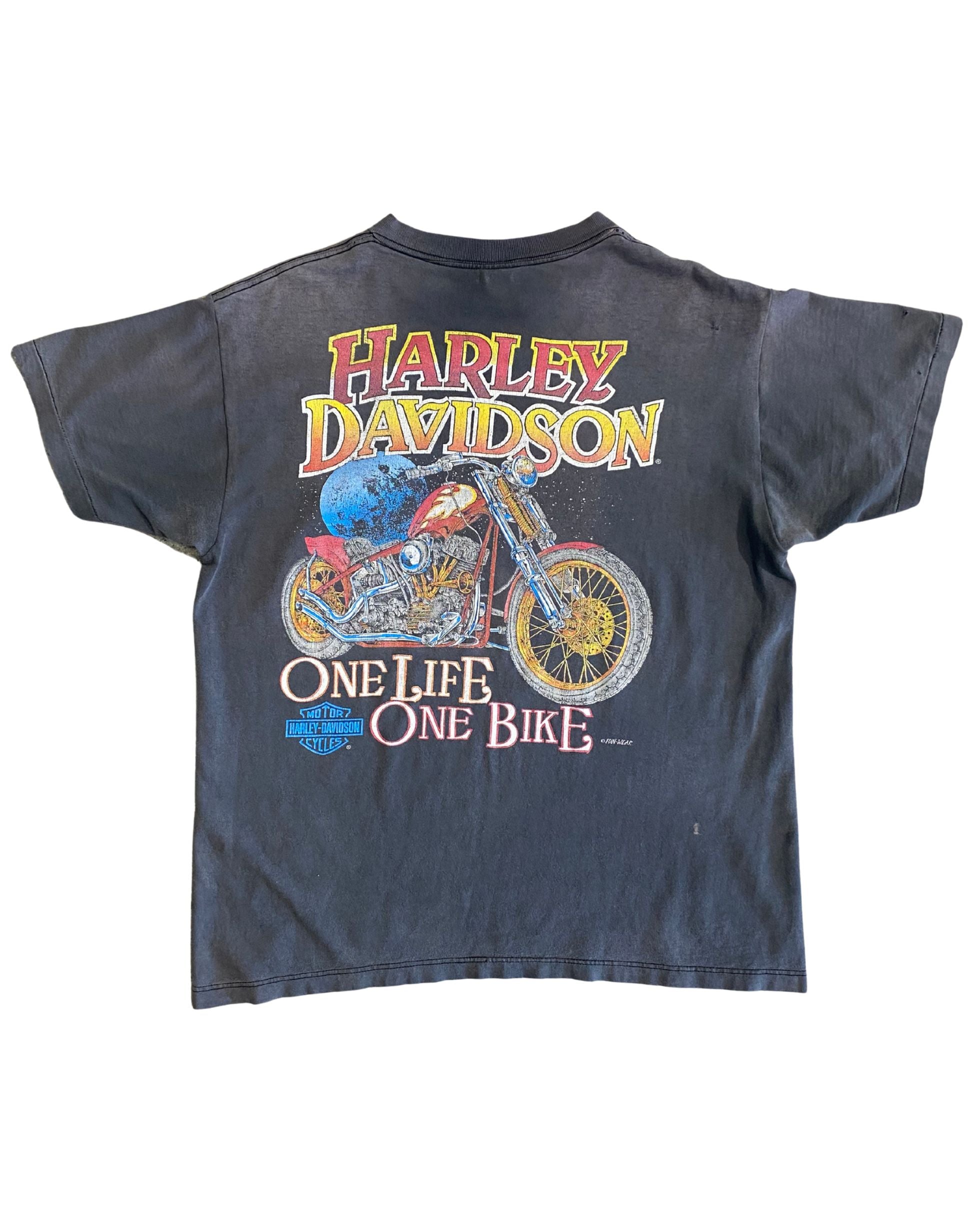 Front of black Harley-Davidson vintage T-shirt with chest pocket and bar & shield logo.