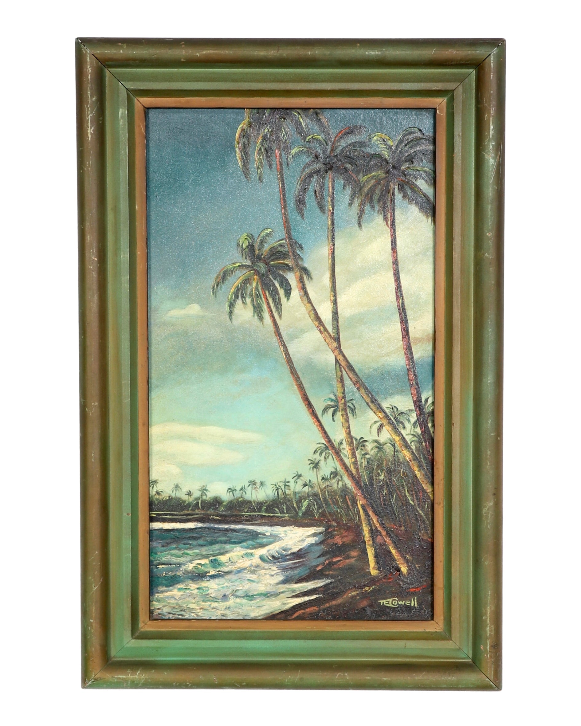 Framed painting depicting a tropical beach scene with tall palm trees leaning towards the ocean, waves crashing onto the shore, and a blue sky with scattered clouds in the background. The frame is wooden with a greenish hue and the painting is signed by the artist in the bottom right corner.