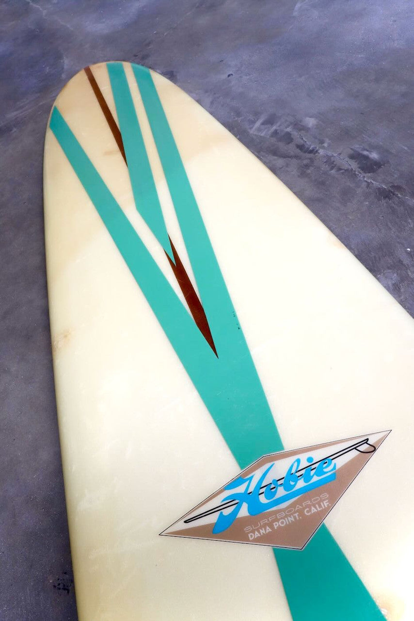 Hobie Surfboard 9'6 Redwood Stringer Neutral w Aqua Stripes Logo and Upper Portion of Deck