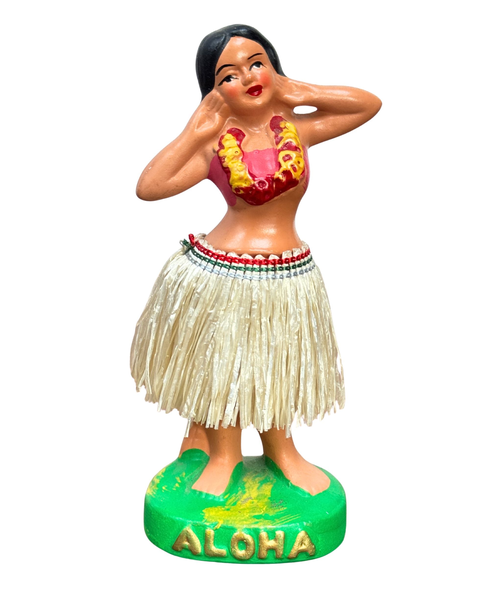 Vintage Hula Girl dancer nodder with straw skirt and red top.