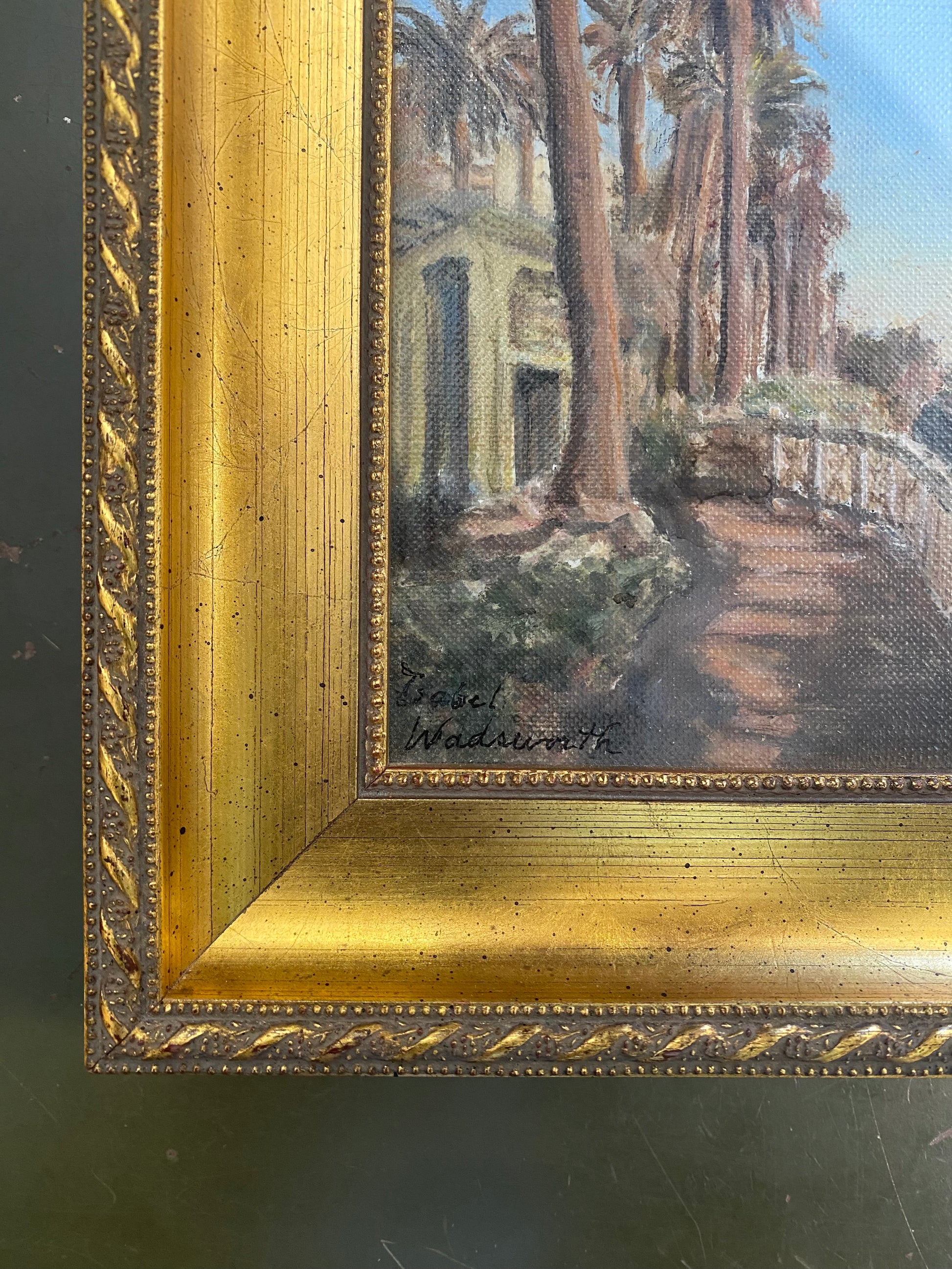 Corner Painting detail with signature - and gold frame.