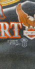 Detail of cracked vintage print showing 1988 3D Emblem mark.