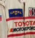 The upclose view of the middle patches on the Juan Manuel Fangio II Auto Racing Suit.
