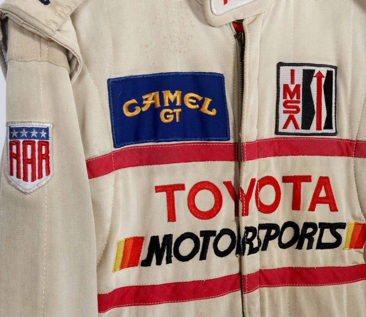 The upclose view of the middle patches on the Juan Manuel Fangio II Auto Racing Suit.