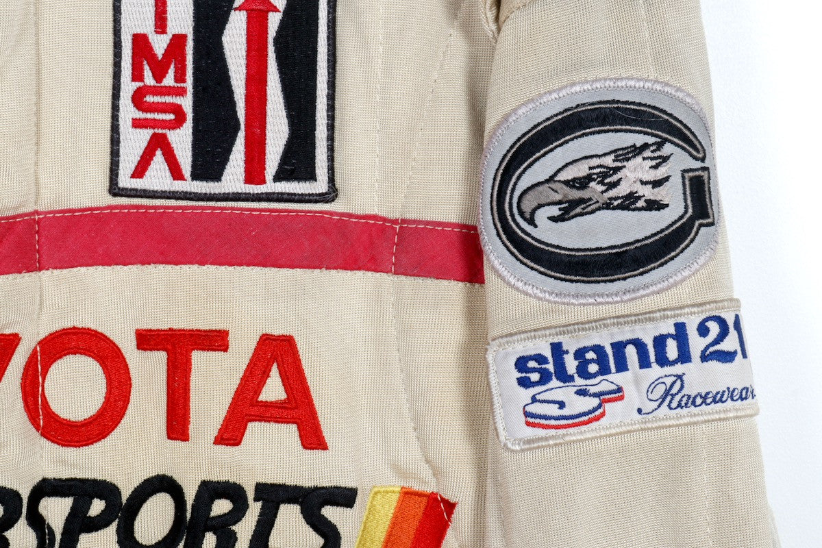 The upclose view of the patches on the Juan Manuel Fangio II Auto Racing Suit.