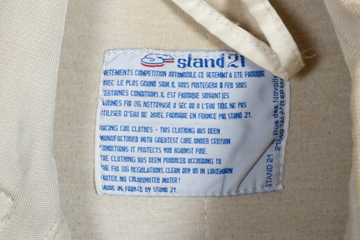 The upclose view of the care label on the Juan Manuel Fangio II Auto Racing Suit.