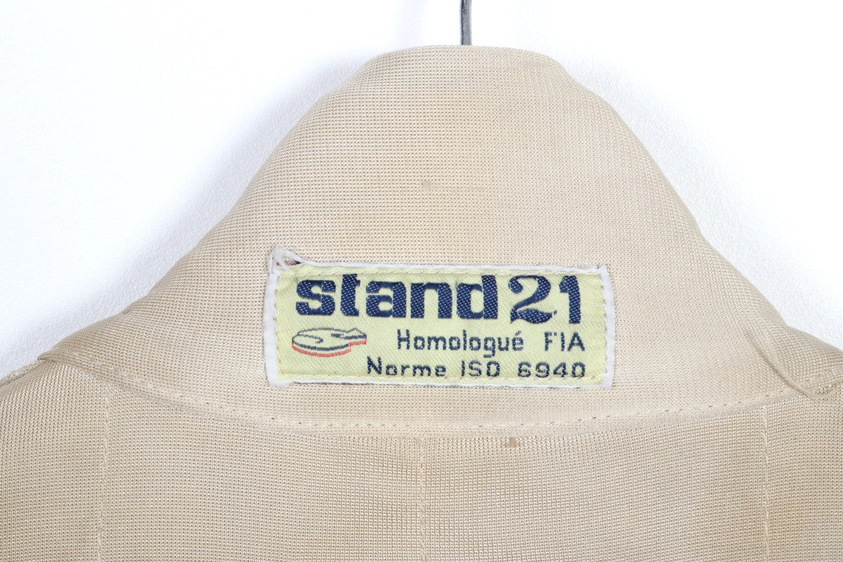 The upclose view of the tag on the Juan Manuel Fangio II Auto Racing Suit.