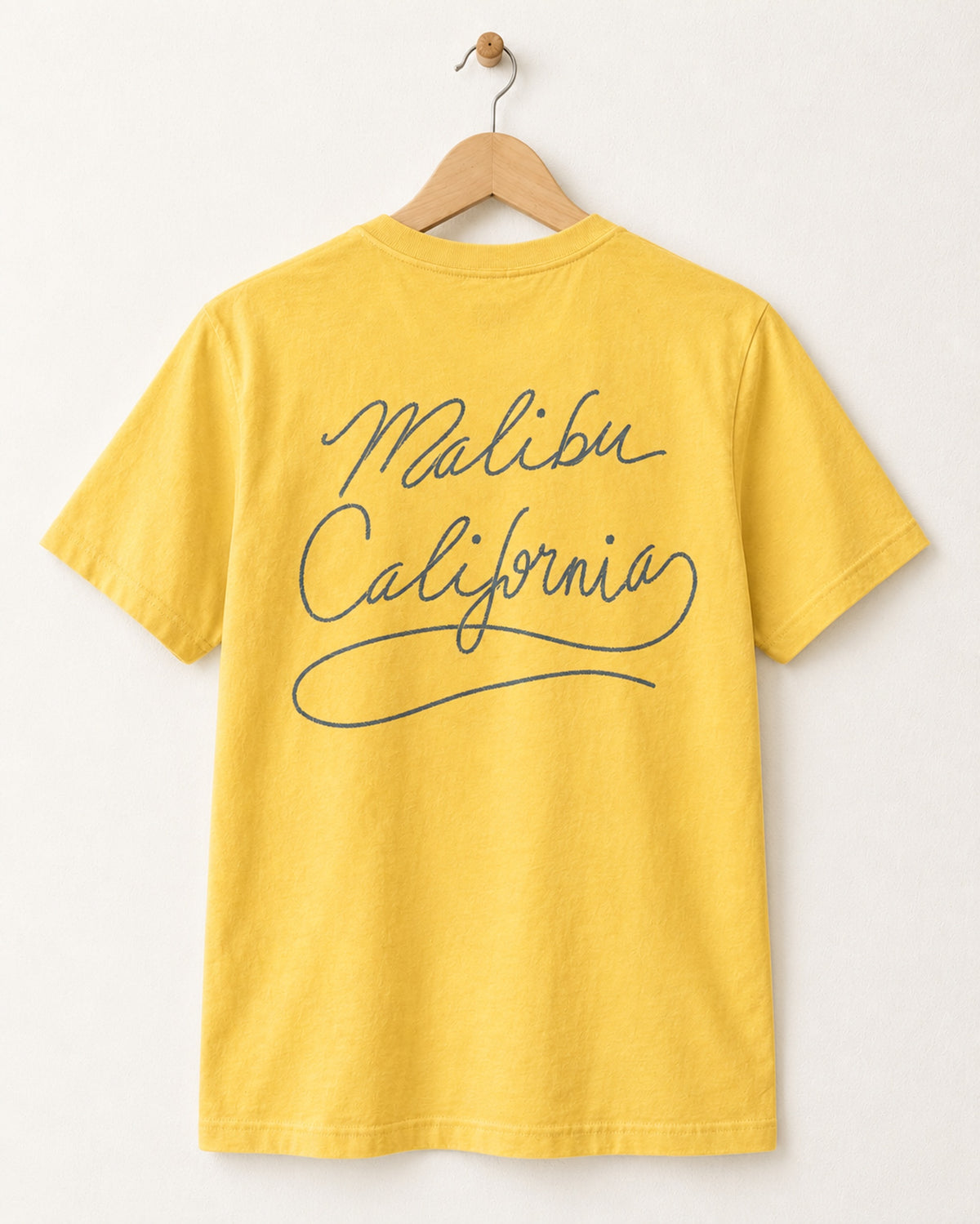 Back view of Surfing Cowboys Kick Ass Adult Classic Crew T-Shirt with the words Malibu California spelled out with lasso rope.