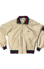 Front view of 1970s Izod Lacoste jacket with green and red trim.