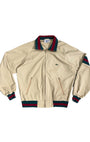 Front view of 1970s Izod Lacoste jacket with green and red trim.