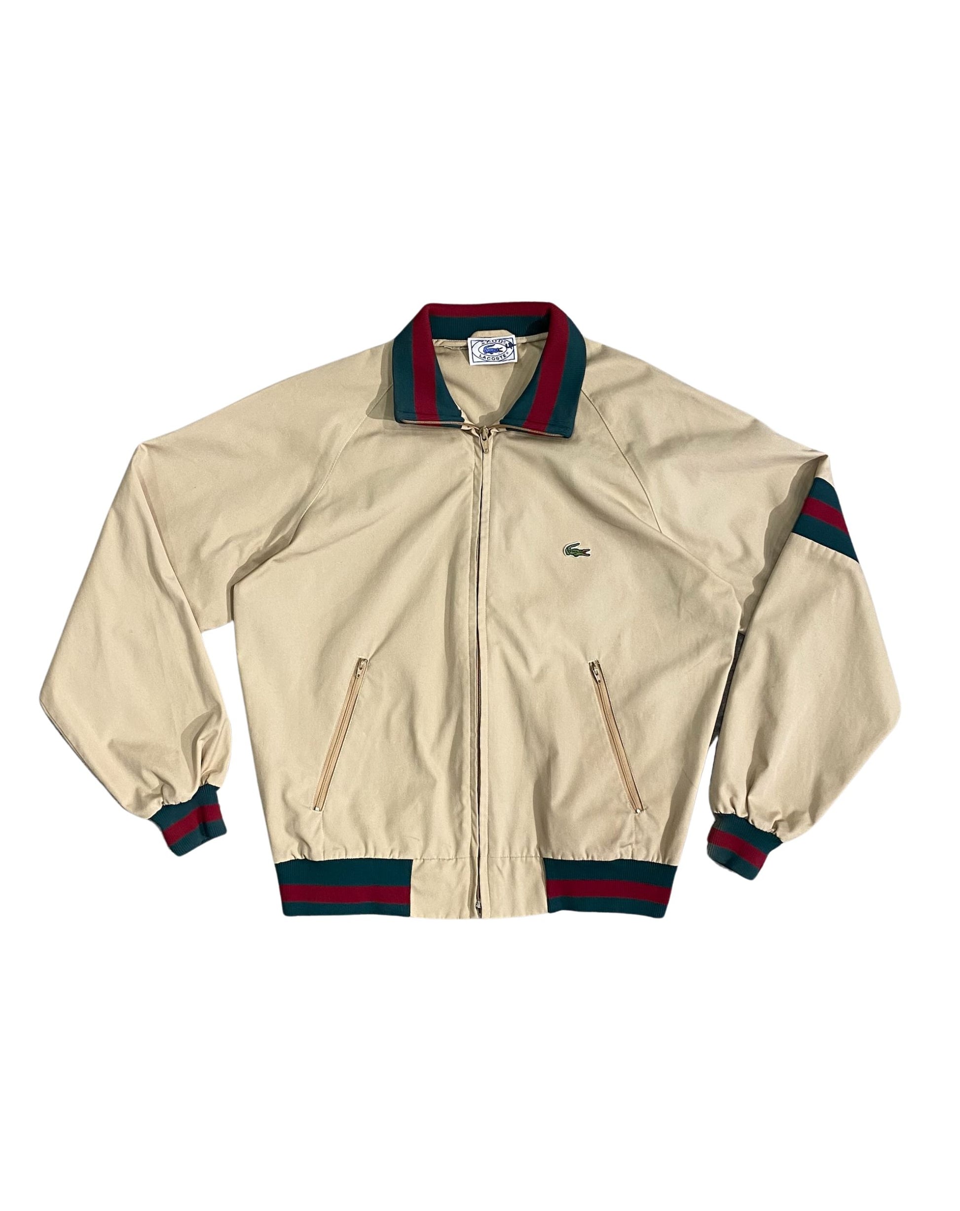 Front view of 1970s Izod Lacoste jacket with green and red trim.