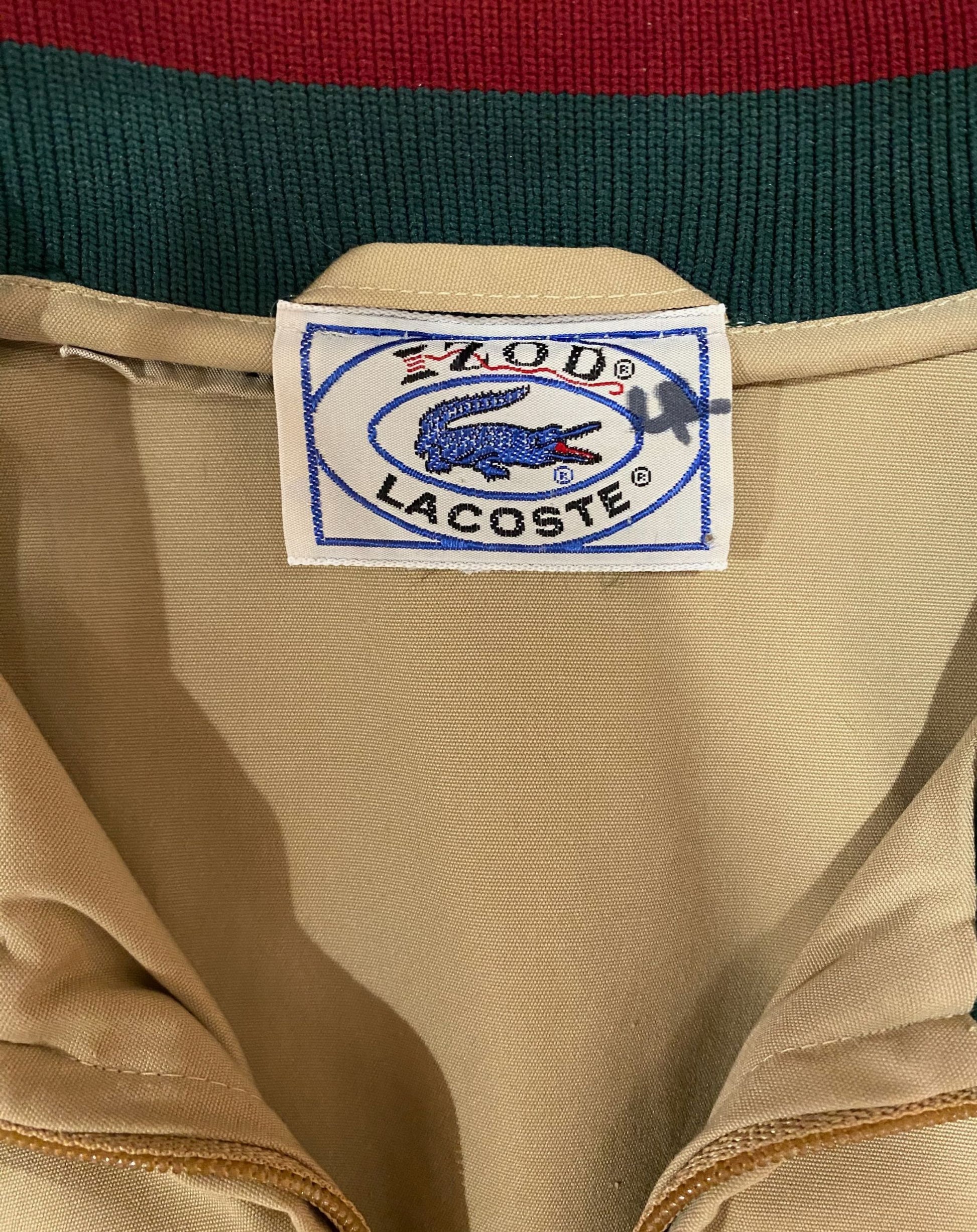 Close-up of blue label on vintage Izod Lacoste jacket.