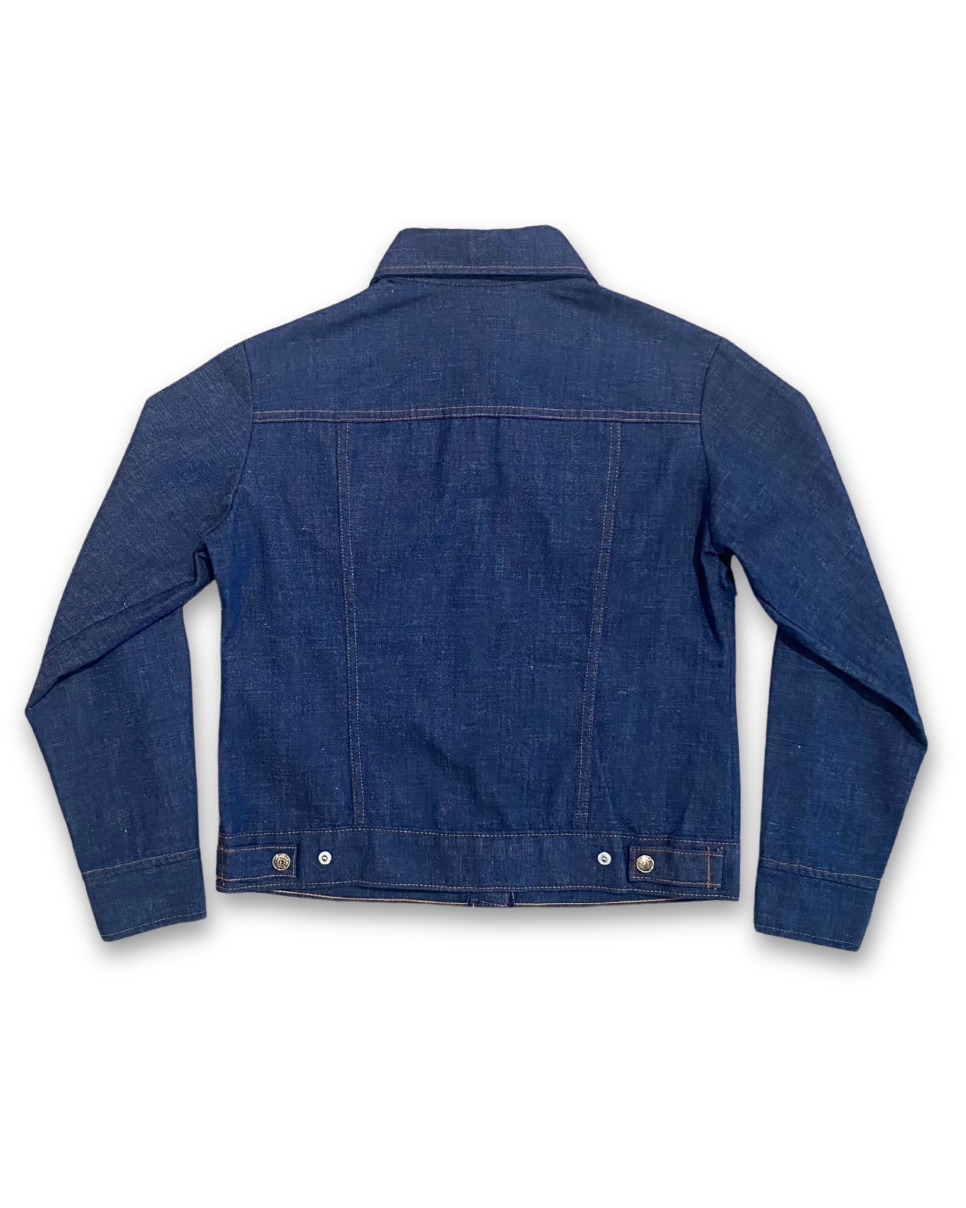 Back view of vintage 1970s Levi’s Orange Tab denim jacket with dark indigo wash and snap closure.
