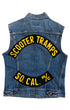 Back view of a faded blue sleeveless Levi’s denim vest with black-and-yellow Scooter Tramps and So. Cal. M/C embroidered patches.