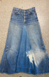 Vintage 1970s Levi’s Orange Tab custom denim maxi skirt with center denim insert, full-length silhouette, fading, and natural wear.