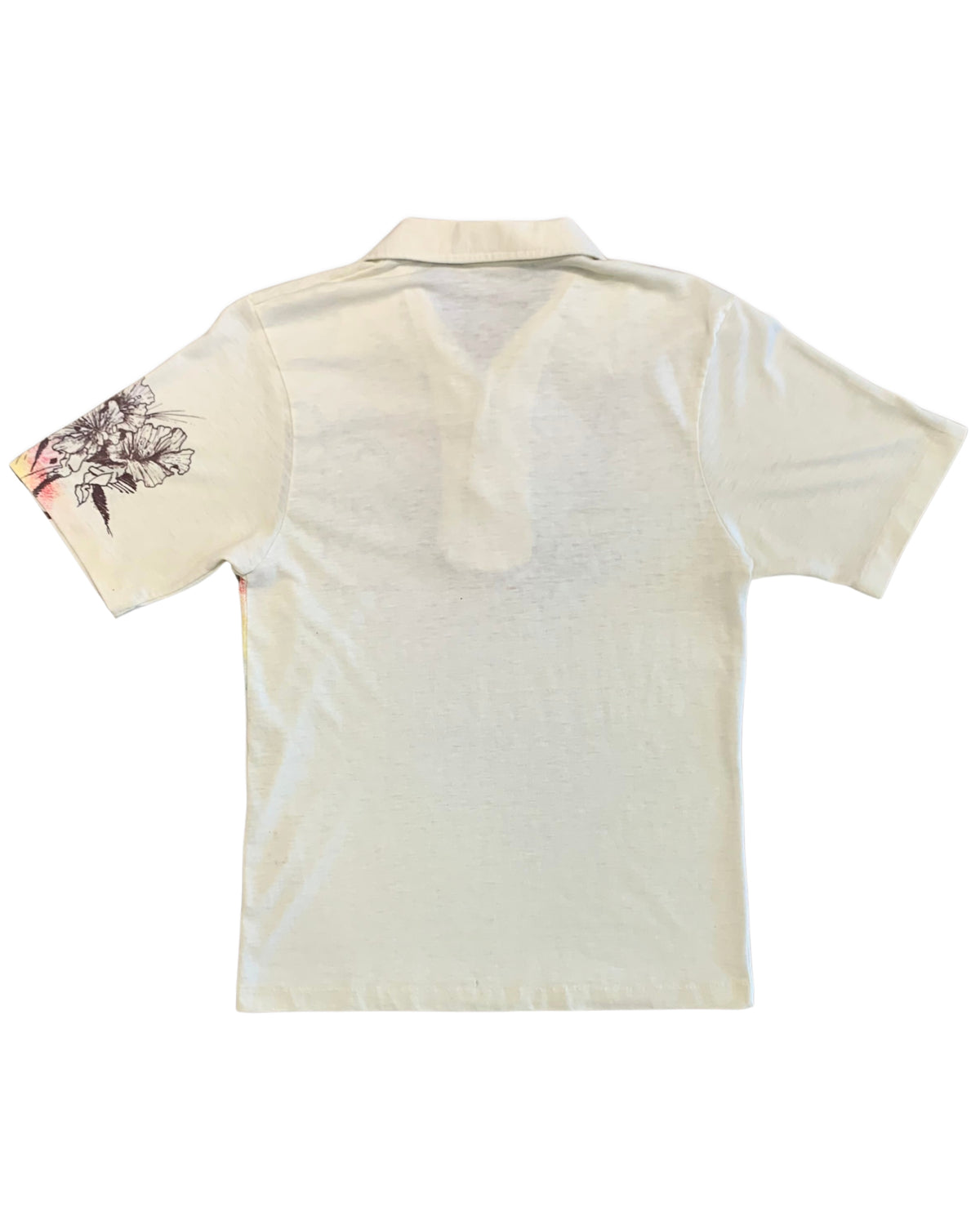 Back view of a cream Lightning Bolt short-sleeve polo with a plain body and floral artwork visible on one sleeve.