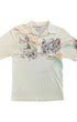 Front view of a cream Lightning Bolt short-sleeve polo with black floral and landscape artwork and rainbow-colored accents across the chest and sleeves.
