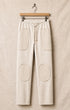 Surfing Cowboys® Surf + Track loopback cotton patch pants in natural, front view, with drawstring waist, stitched patch pockets, and reinforced knees.