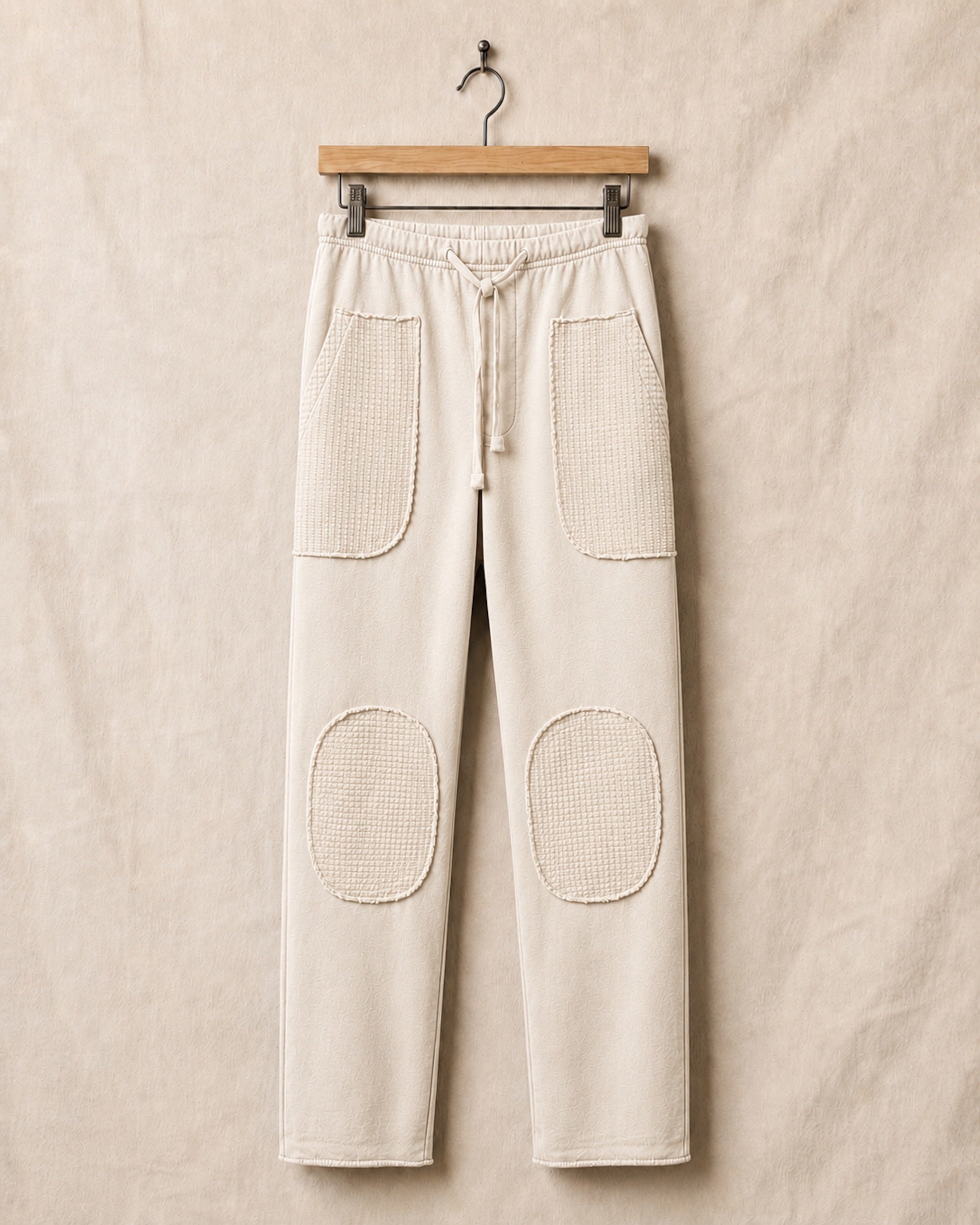 Surfing Cowboys® Surf + Track loopback cotton patch pants in natural, front view, with drawstring waist, stitched patch pockets, and reinforced knees.