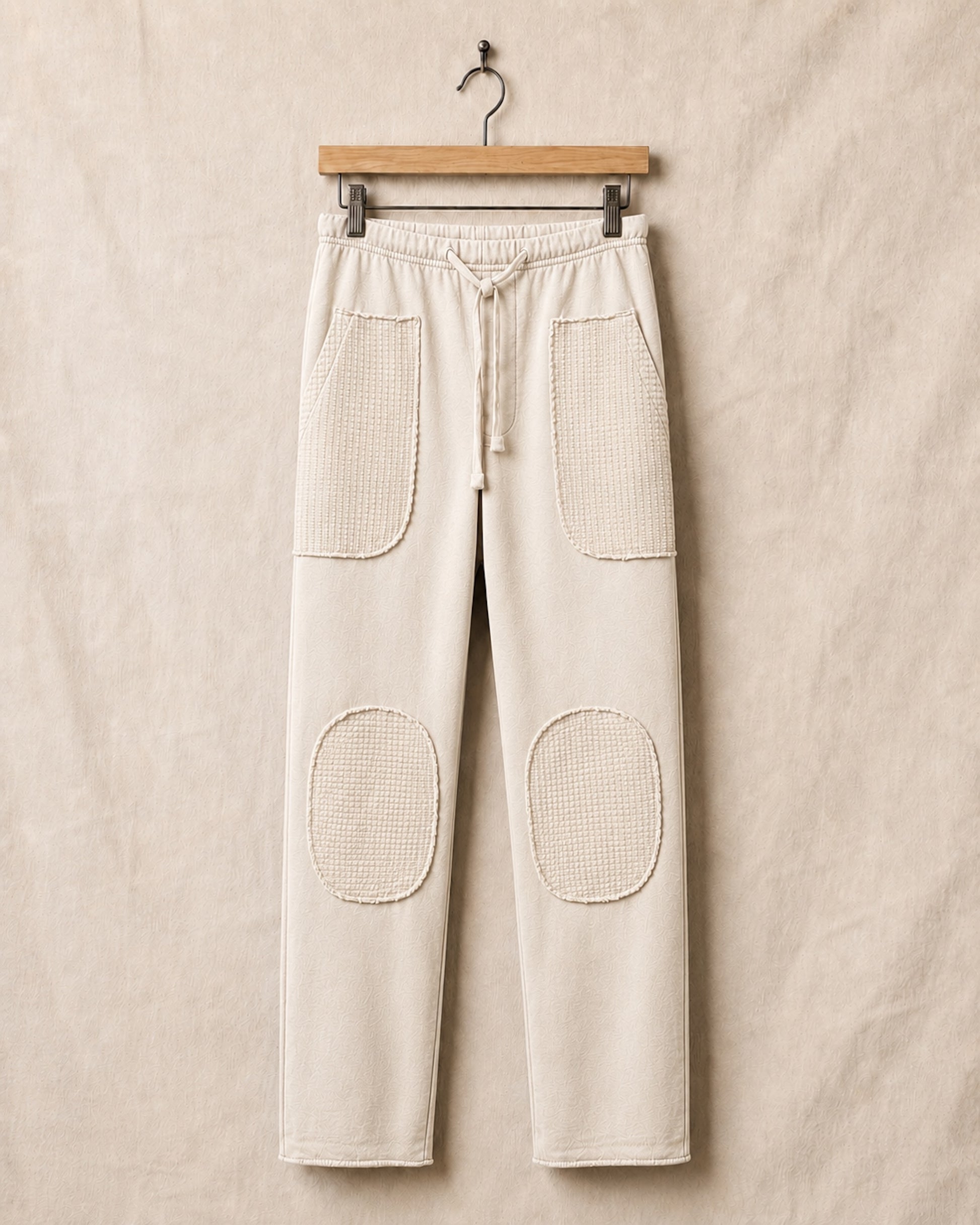 Surfing Cowboys® Surf + Track loopback cotton patch pants in natural, front view, with drawstring waist, stitched patch pockets, and reinforced knees.