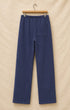 Surfing Cowboys® Weekender loopback cotton pants in washed navy, back view, with single patch pocket.
