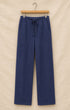 Surfing Cowboys Weekender loopback cotton pants in washed navy, front view, with drawstring waist and oversized patch pockets.