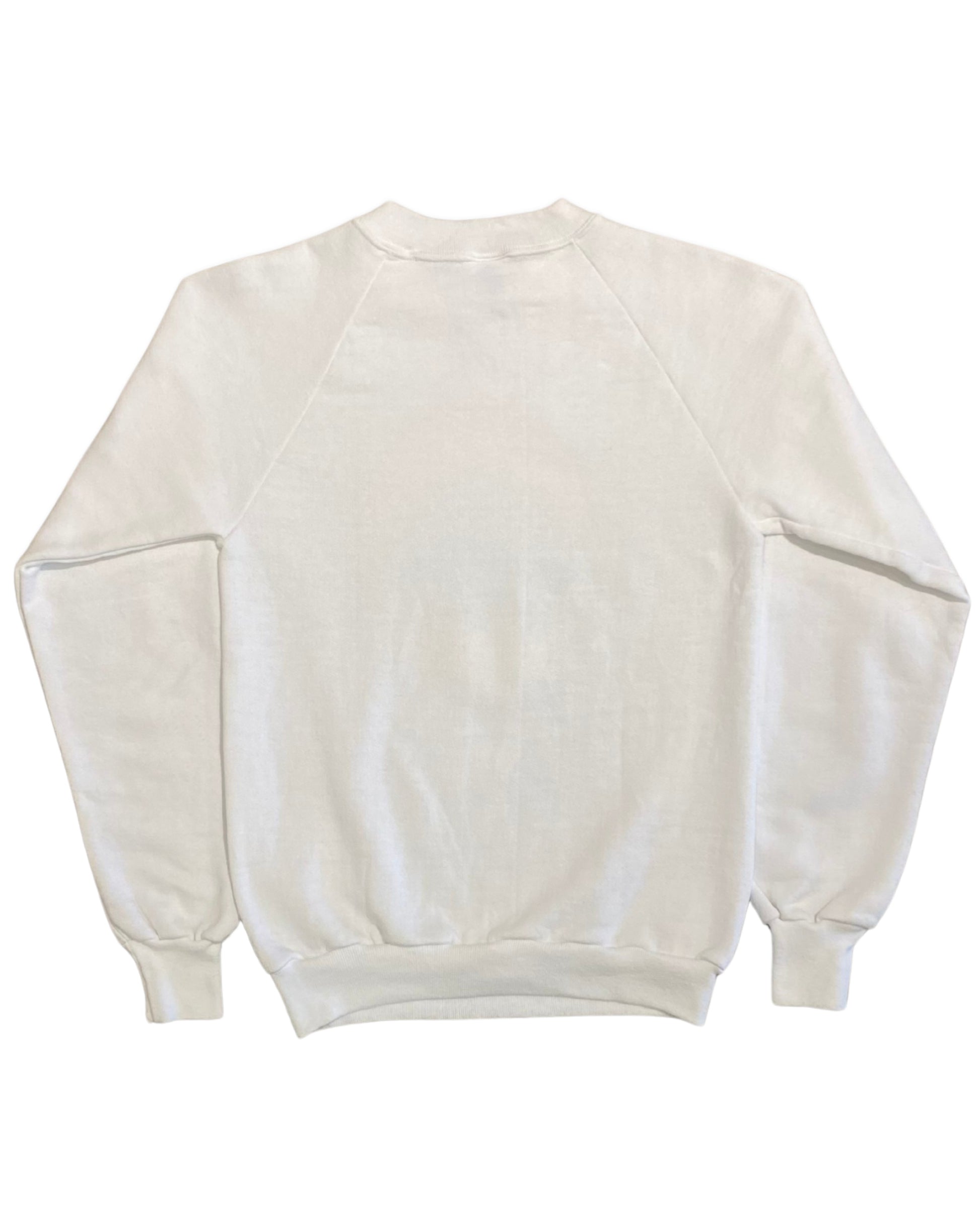 Back view of a vintage white 1980s raglan sweatshirt with a plain back and ribbed waistband and cuffs.