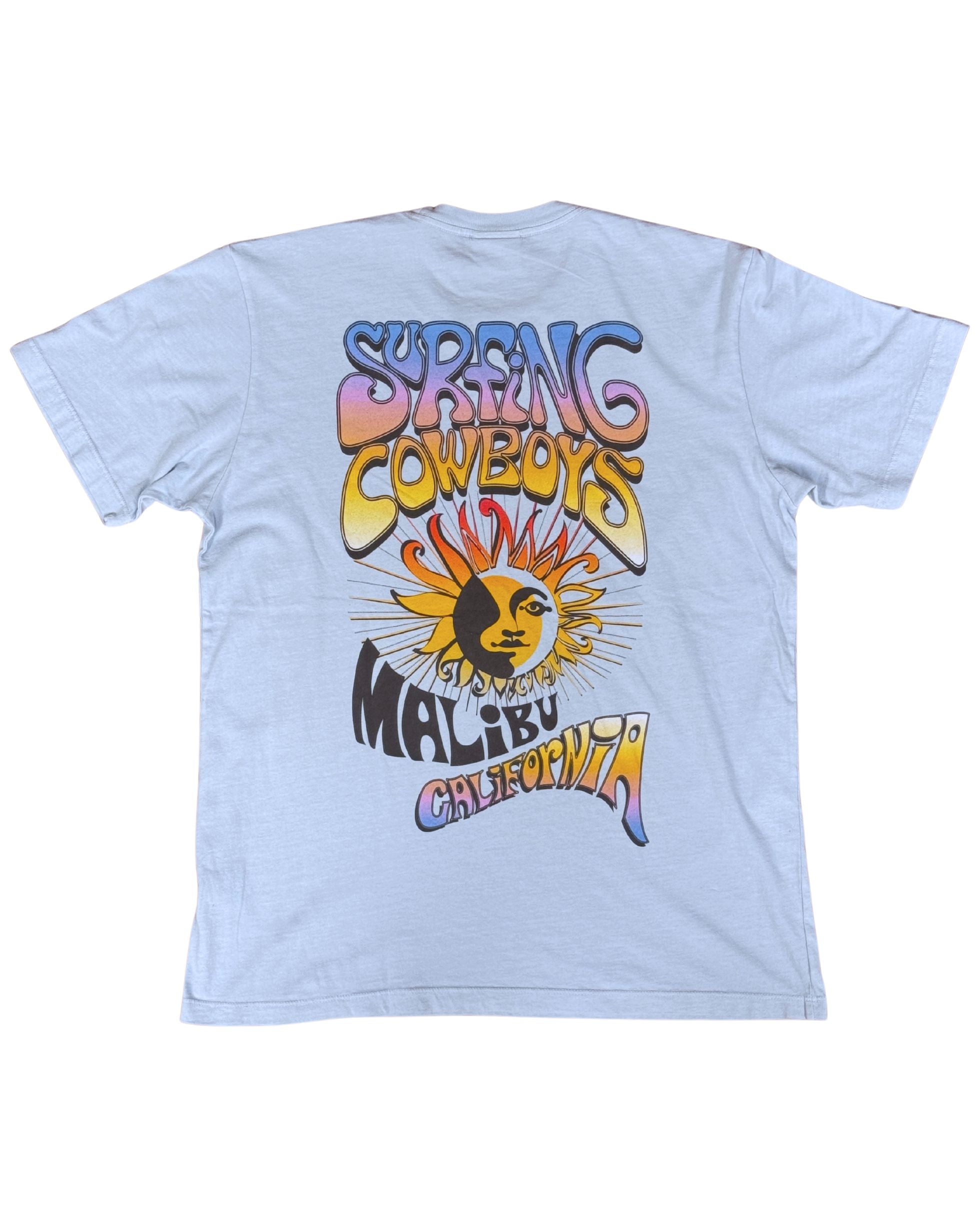 Back view of Surfing Cowboys Lowrider Sun T-Shirt in washed sky blue with multicolor psychedelic sun graphic.