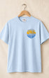 Front view of Sky Blue Surfing Cowboys Lowrider Sun classic T-shirt with small front chest graphic. 