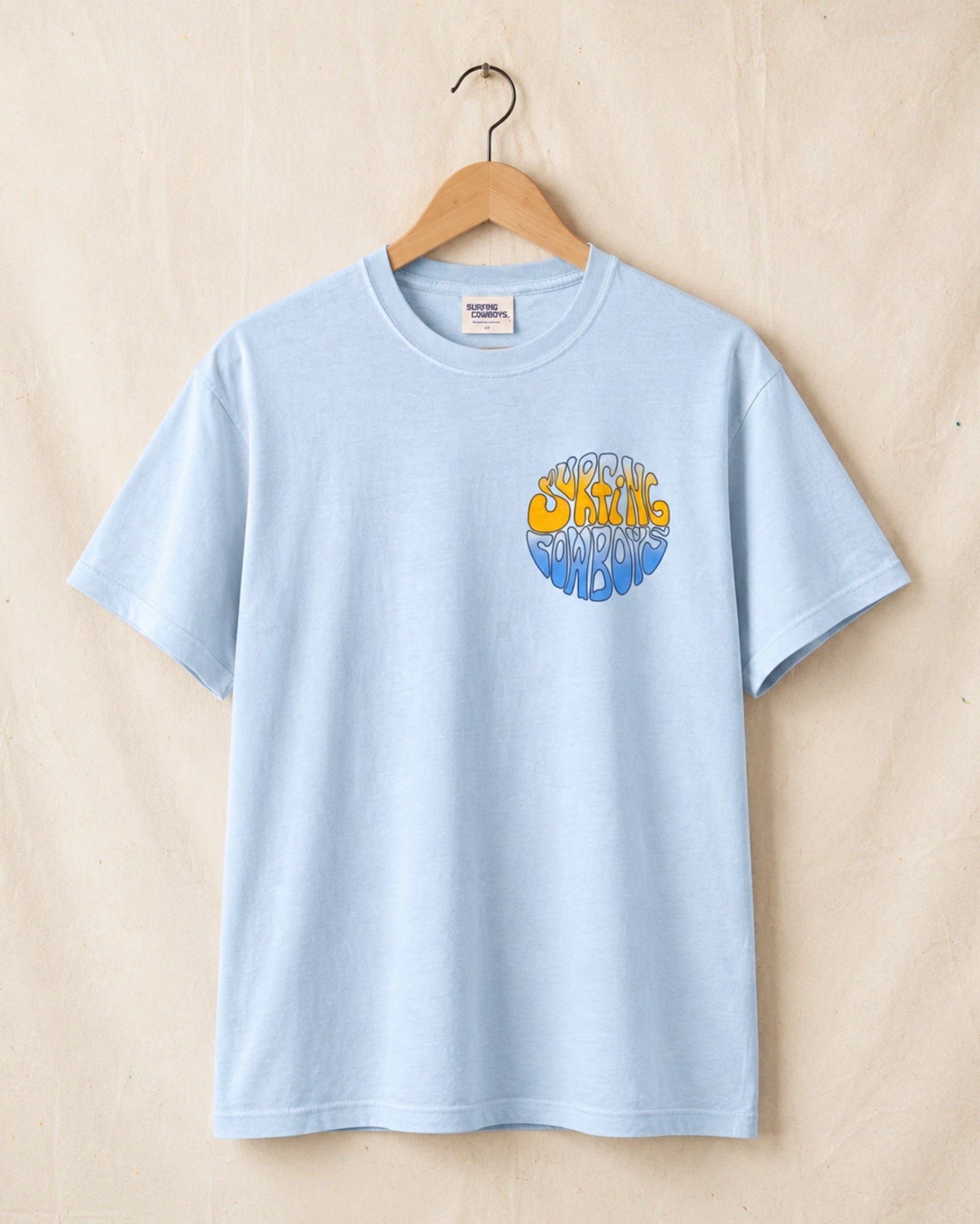 Front view of Sky Blue Surfing Cowboys Lowrider Sun classic T-shirt with small front chest graphic. 