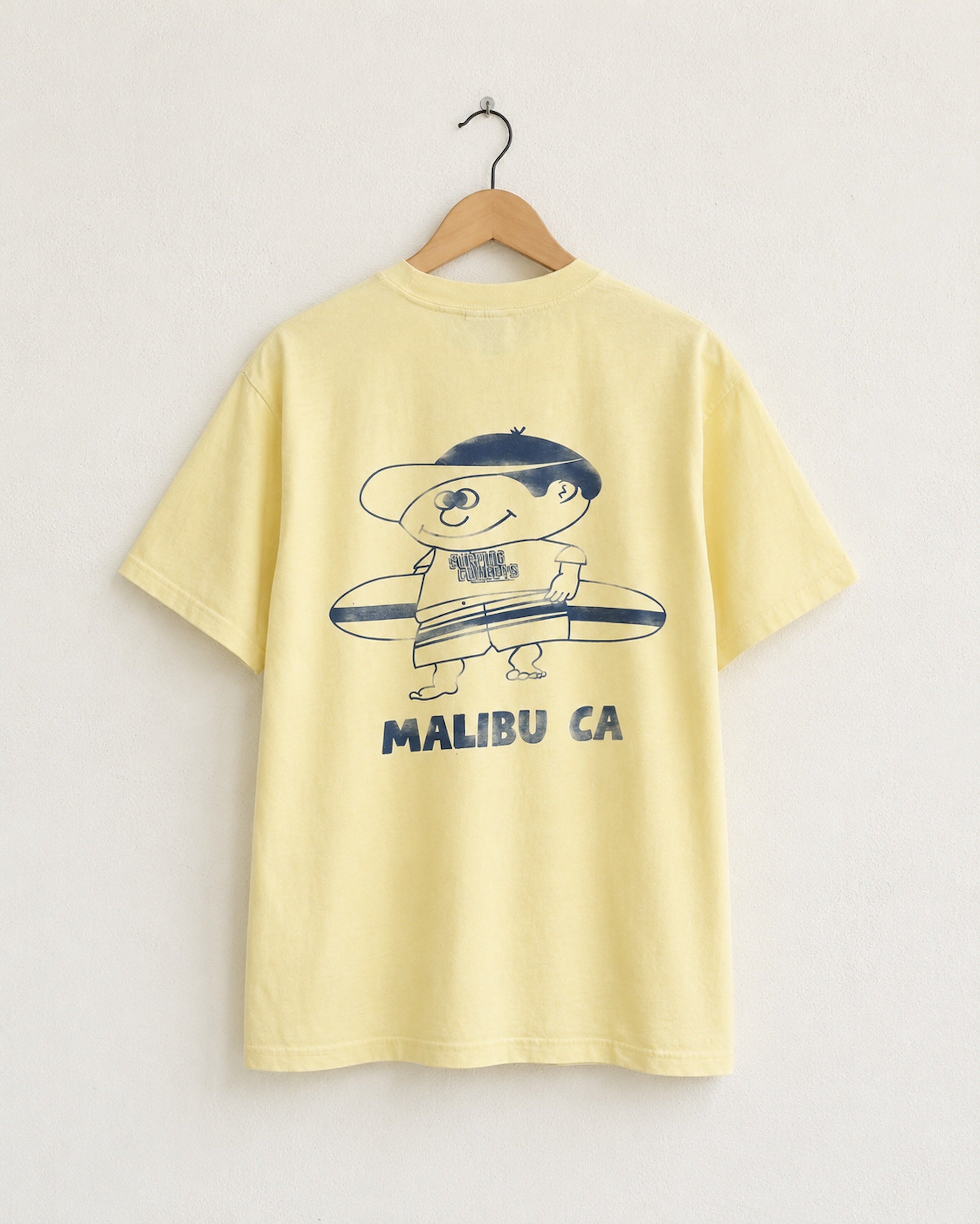 Surfing Cowboys Making Waves High Crew Pocket T-Shirt with graphic back view featuring surfer boy with board.