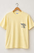 Surfing Cowboys Making Waves High Crew Pocket T-Shirt with graphic front view on hanger.