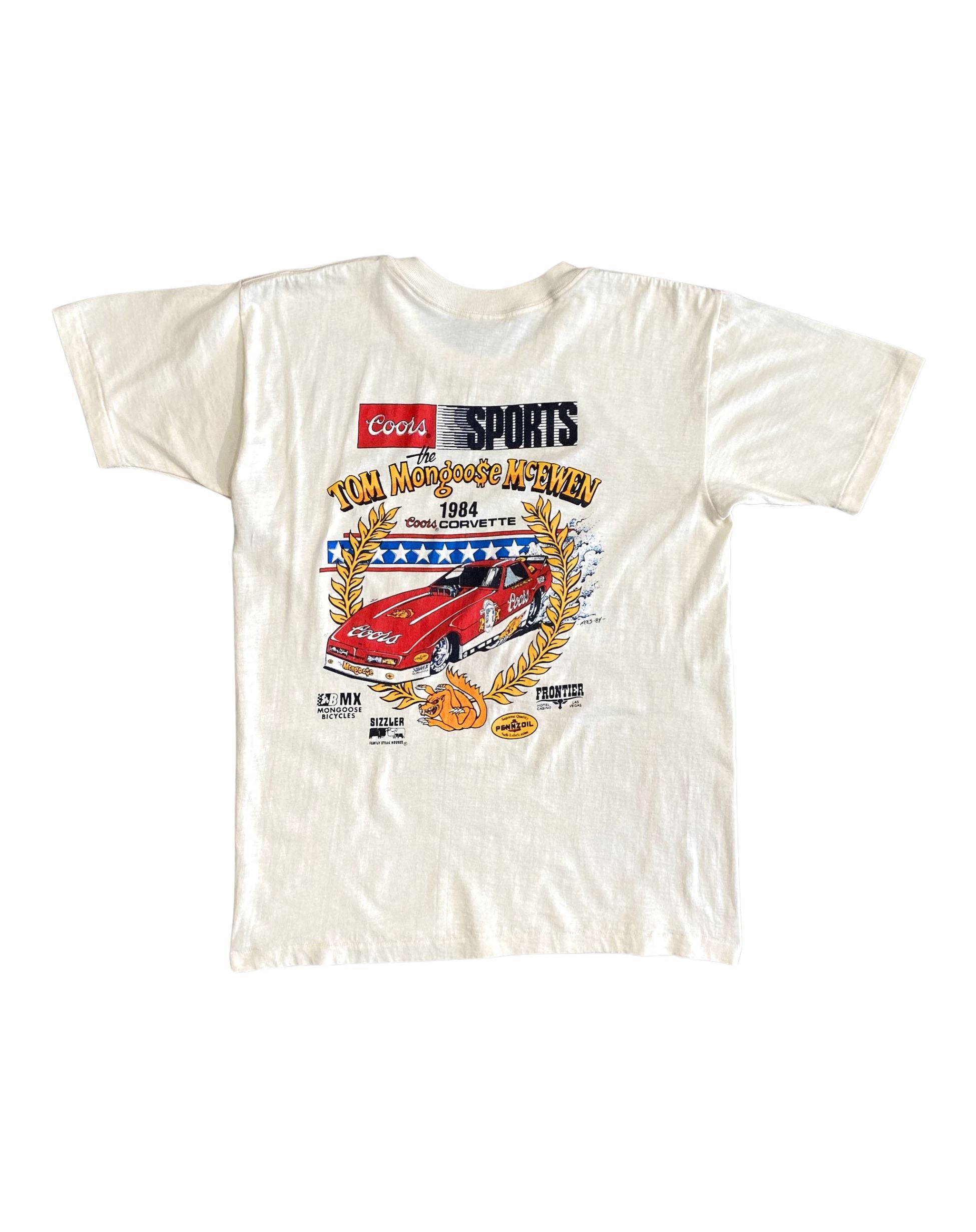 Back of 1984 Tom “Mongoose” McEwen Coors Corvette Olympic Year Tour T-shirt with bold car graphic.