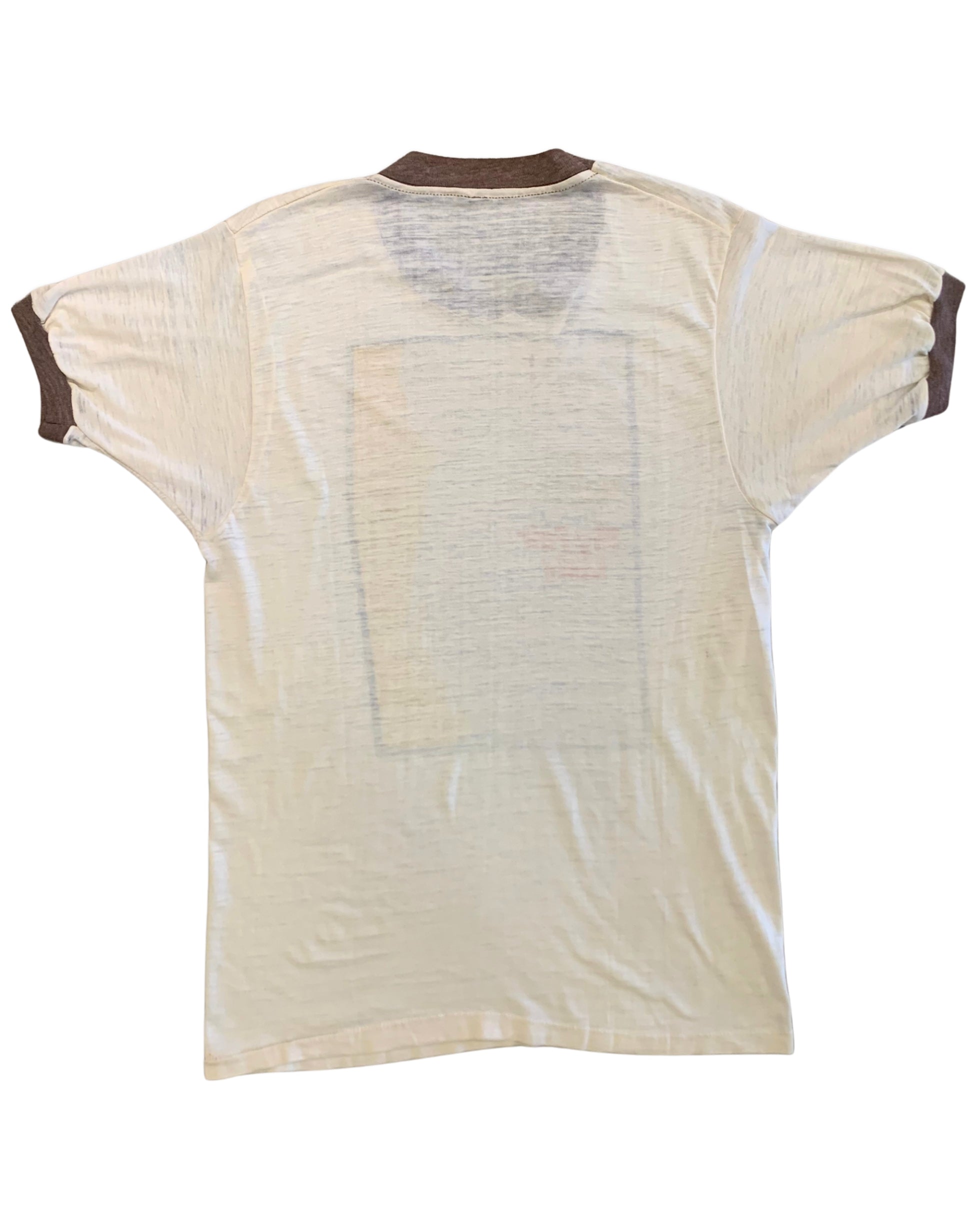 The blank back view of a rare vintage 1970s My Fair Lady theatrical promo tee showcasing the ultra-thin, distressed cream knit fabric and brown ringer collar.