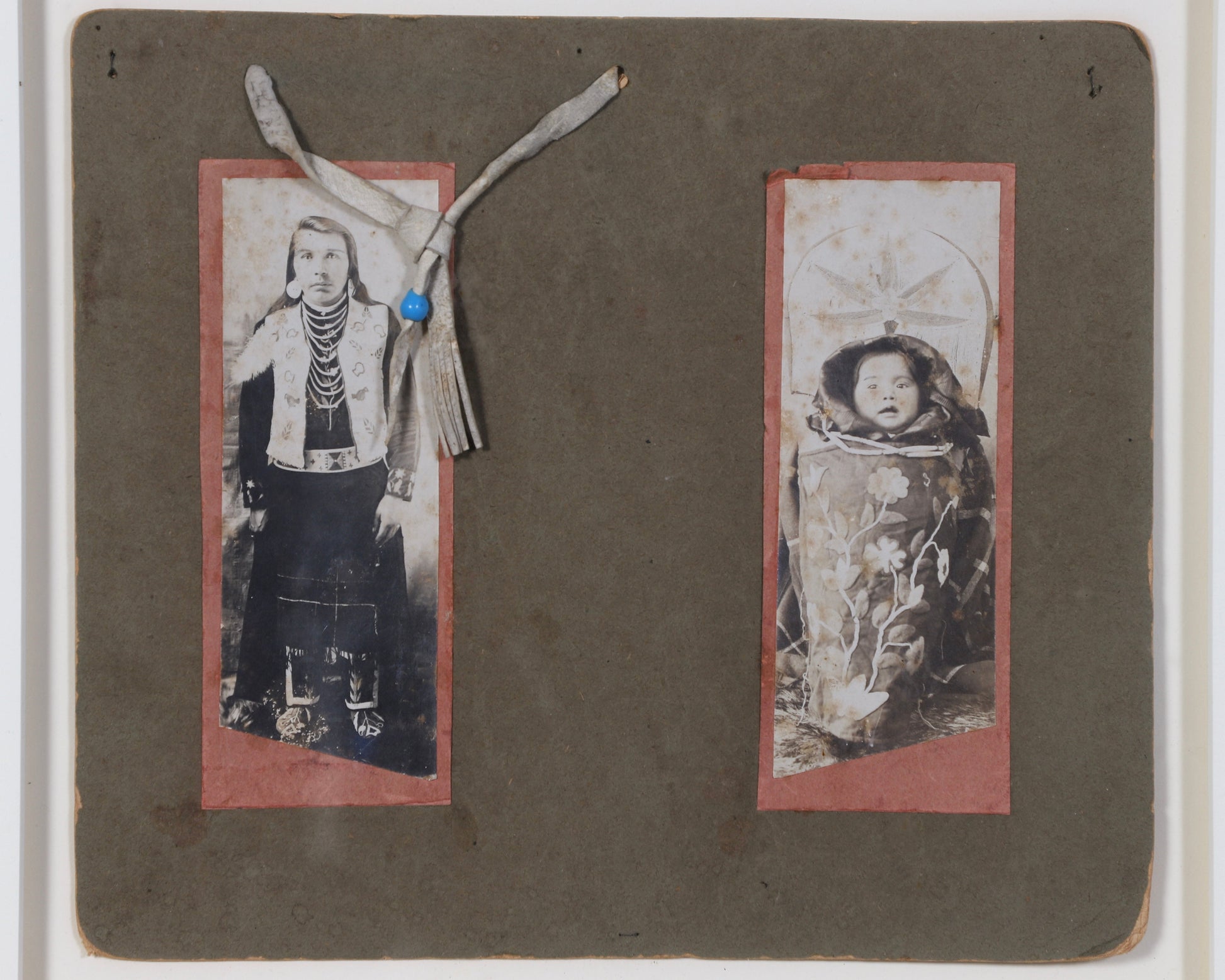 Framed pair of 19th-century Native American photographic portraits presented on a dark gray mount.