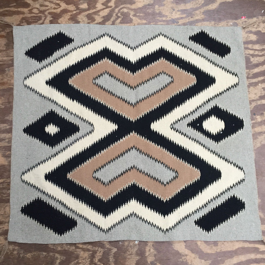 The full view of the Navajo Eye Dazzler Saddle Blanket, circa 1940s.