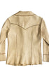 Back view of cream-colored leather shirt-jacket with wide 70s collar and stitched accents.