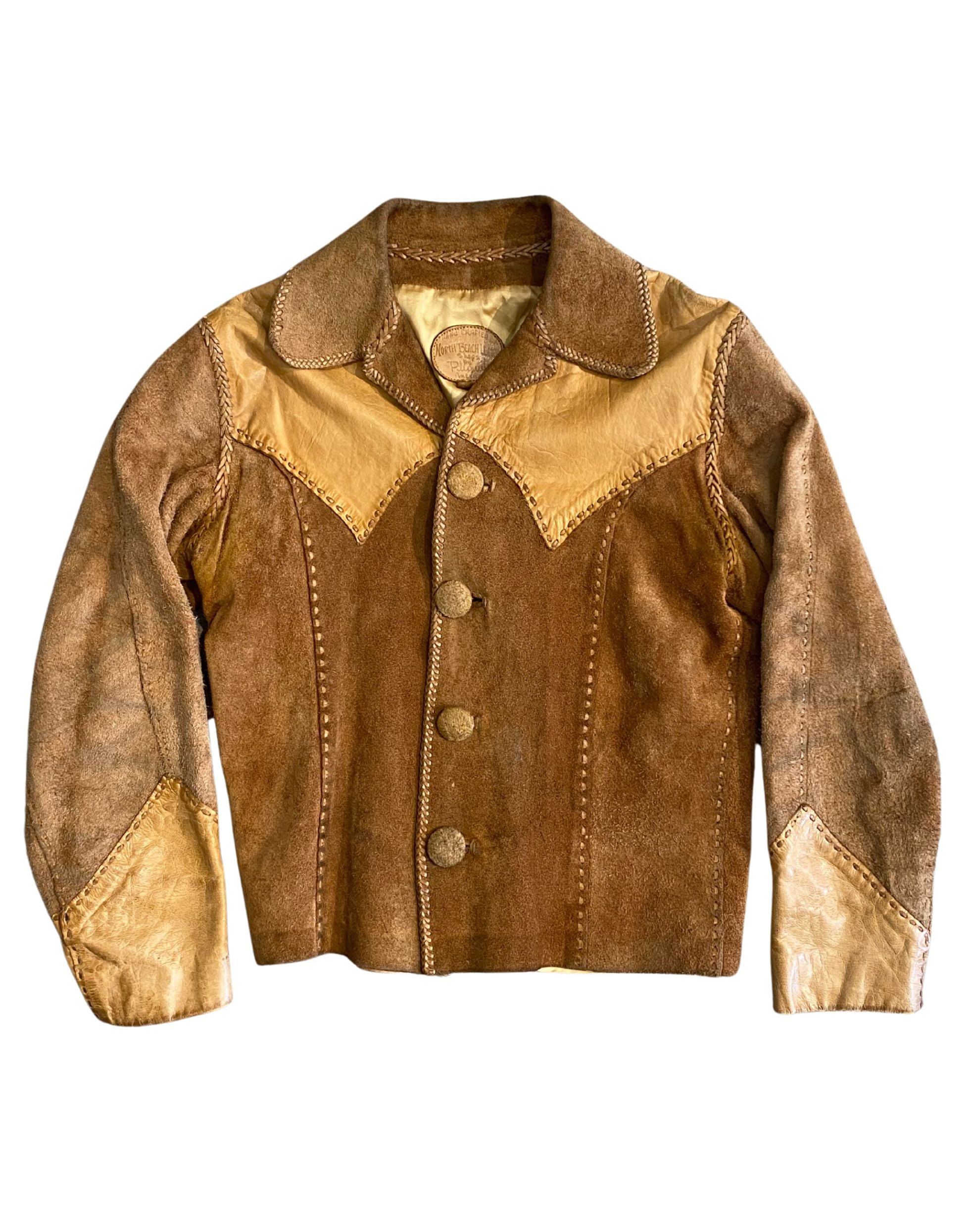 Front view of 1970s North Beach Leather women’s jacket in two-tone suede and leather with whipstitch trim.